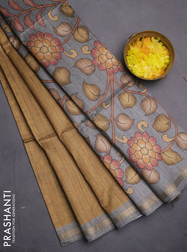Semi tussar saree mustard shade and grey with plain body and kalamkari printed pallu