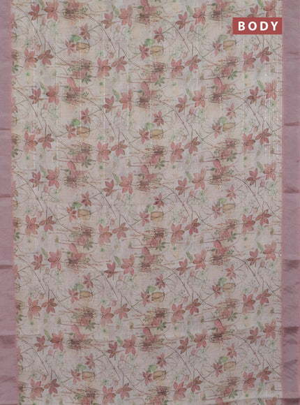 Linen cotton saree cream and peach shade with allover floral pirnts & sequin work and silver zari woven border