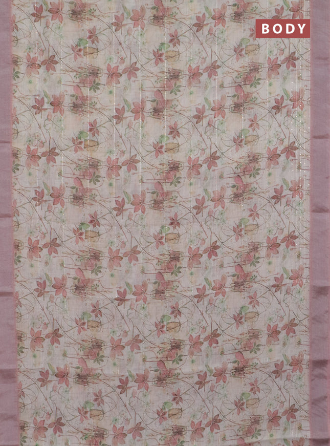 Linen cotton saree cream and peach shade with allover floral pirnts & sequin work and silver zari woven border