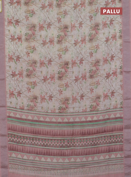 Linen cotton saree cream and peach shade with allover floral pirnts & sequin work and silver zari woven border