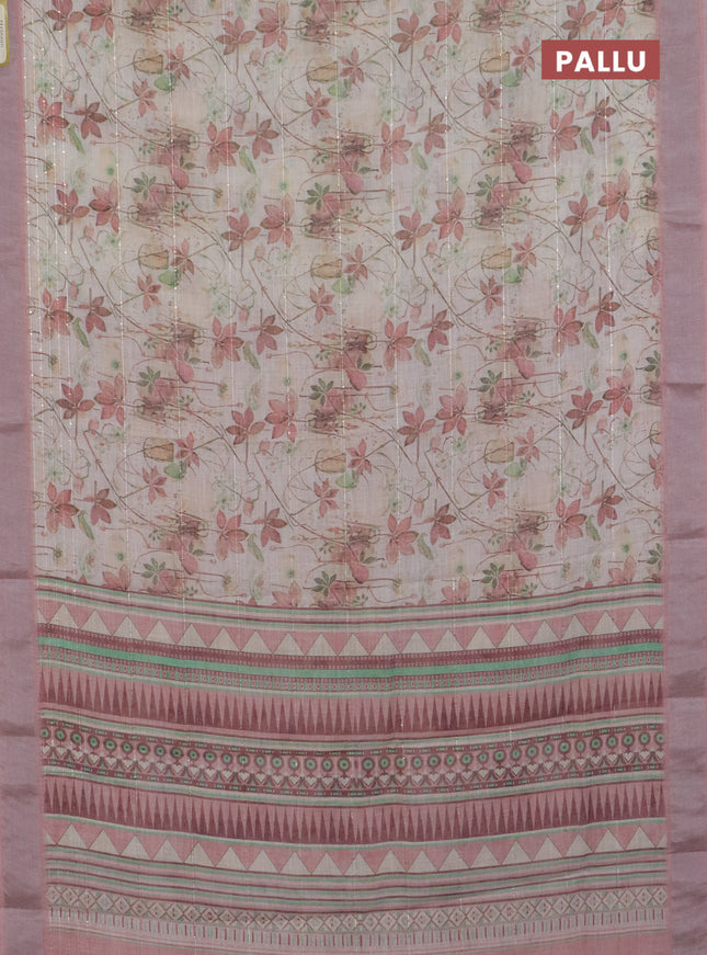 Linen cotton saree cream and peach shade with allover floral pirnts & sequin work and silver zari woven border