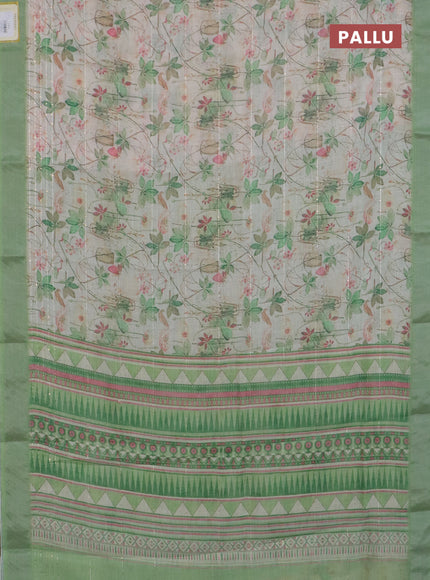 Linen cotton saree ccream and green with allover floral pirnts & sequin work and silver zari woven border