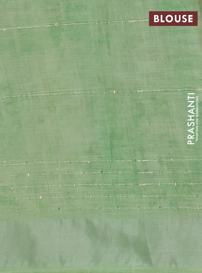 Linen cotton saree ccream and green with allover floral pirnts & sequin work and silver zari woven border