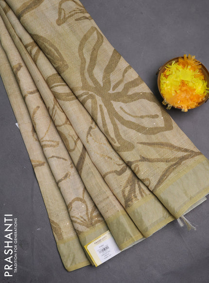 Linen cotton saree sandal and elaichi green with allover floral pirnts & sequin work and silver zari woven border