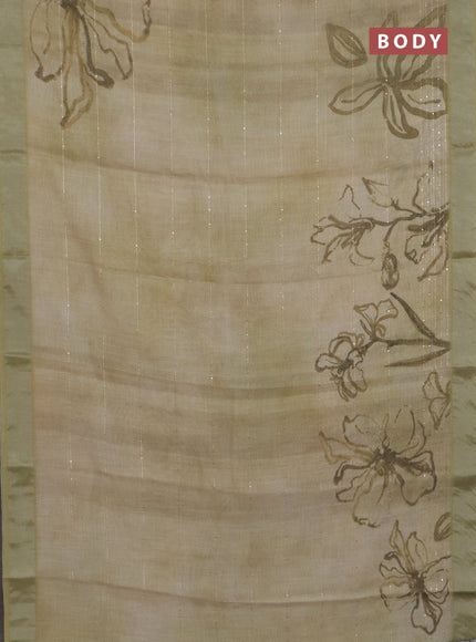 Linen cotton saree sandal and elaichi green with allover floral pirnts & sequin work and silver zari woven border