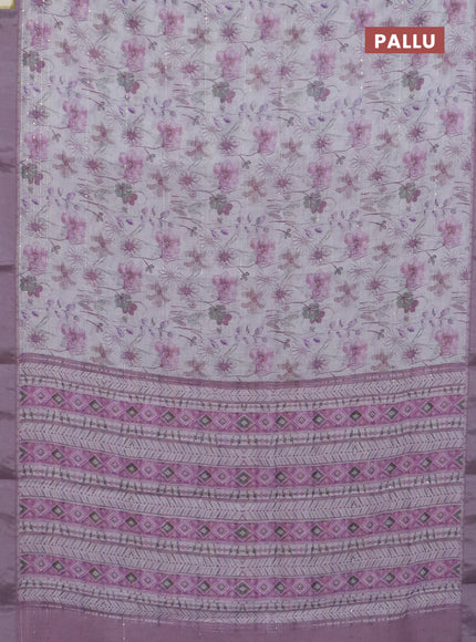 Linen cotton saree off white and pastel pink with allover floral pirnts & sequin work and silver zari woven border