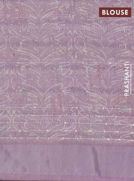 Linen cotton saree off white and pastel pink with allover floral pirnts & sequin work and silver zari woven border