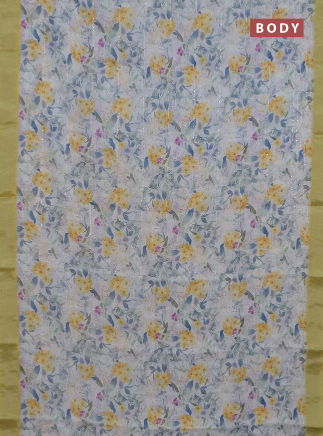 Linen cotton saree off white and yellow with allover floral prints & sequin work and silver zari woven border