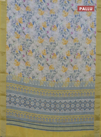 Linen cotton saree off white and yellow with allover floral prints & sequin work and silver zari woven border