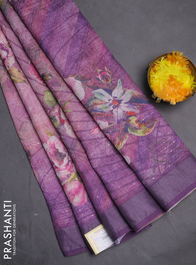 Linen cotton saree mild lavender and violet with allover floral prints & sequin work and silver zari woven border