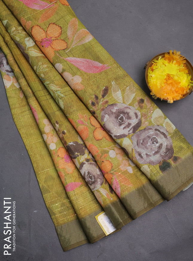 Linen cotton saree light green with allover floral prints & sequin work and silver zari woven border