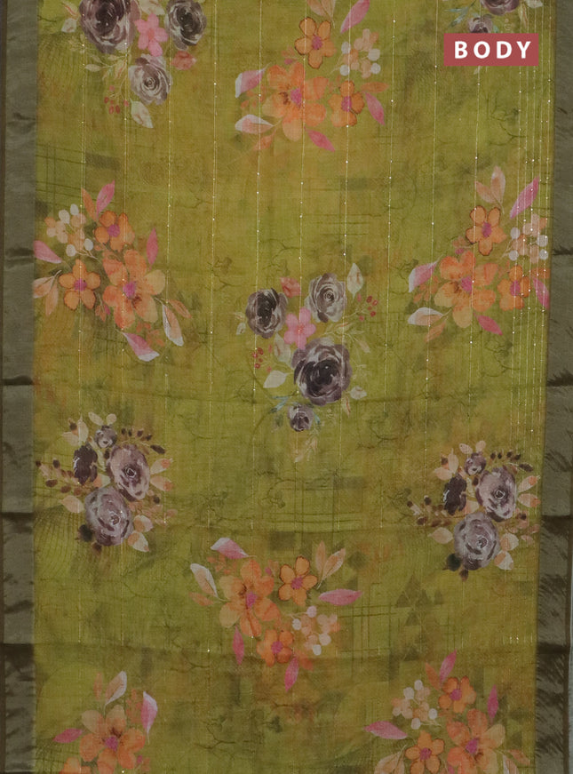 Linen cotton saree light green with allover floral prints & sequin work and silver zari woven border