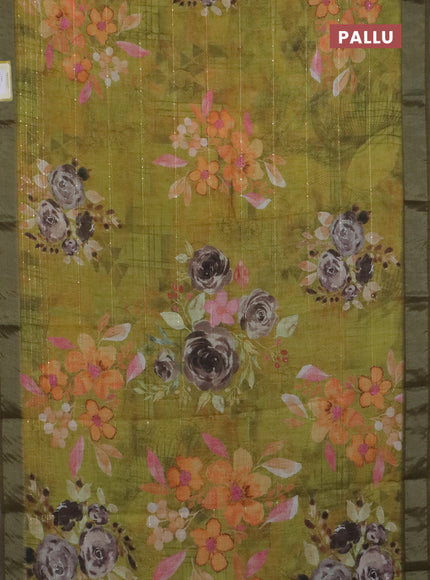 Linen cotton saree light green with allover floral prints & sequin work and silver zari woven border