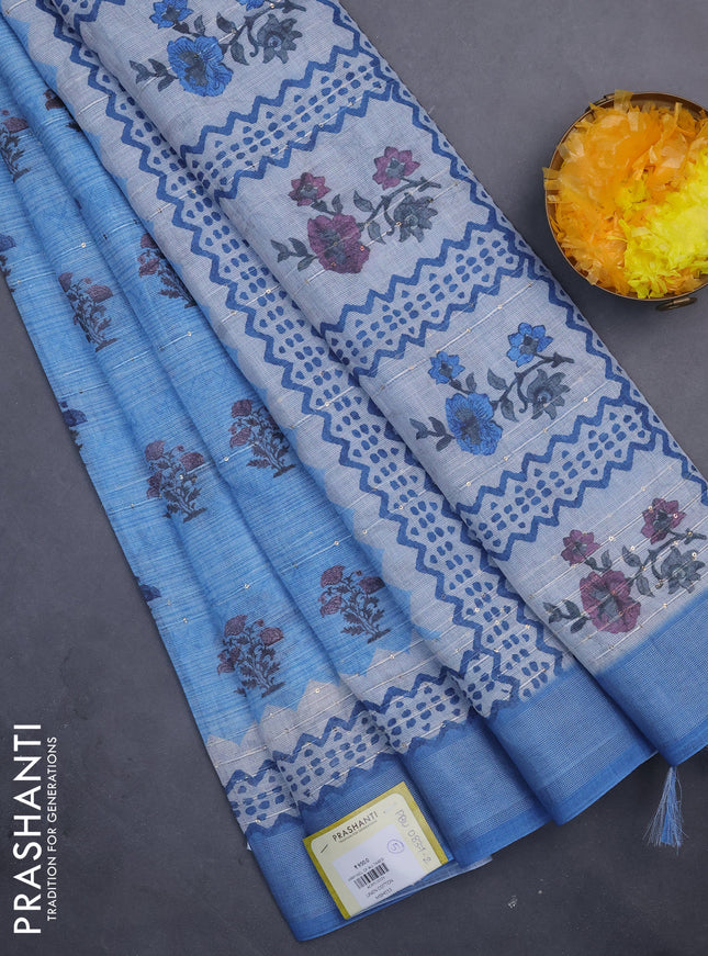 Linen cotton saree blue shade with floral butta prints & sequin work and silver zari woven border