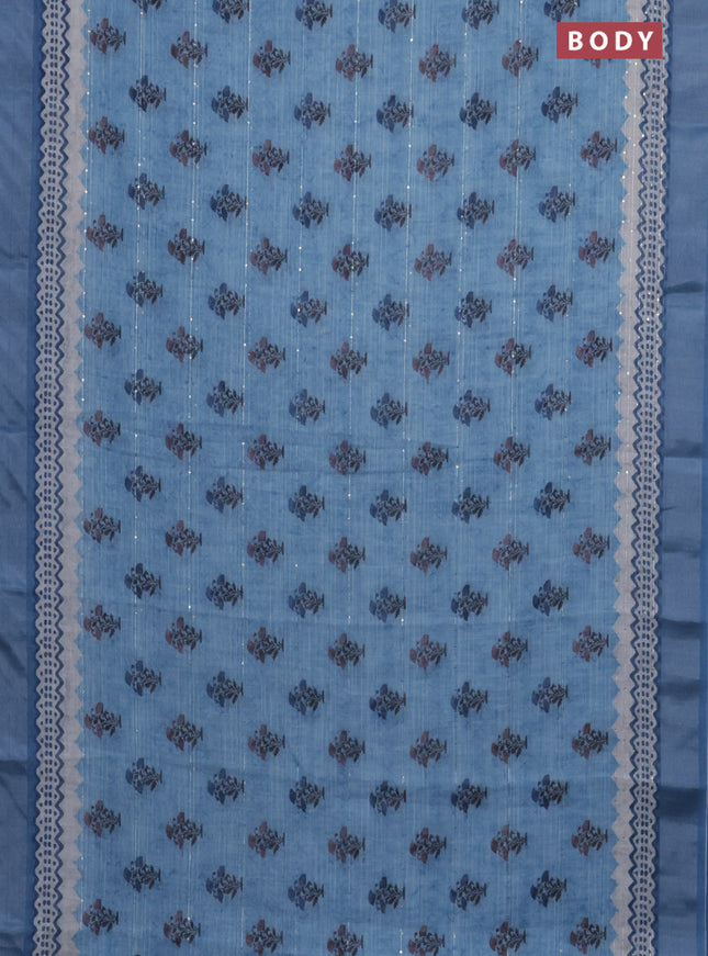 Linen cotton saree blue shade with floral butta prints & sequin work and silver zari woven border