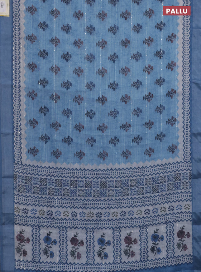 Linen cotton saree blue shade with floral butta prints & sequin work and silver zari woven border
