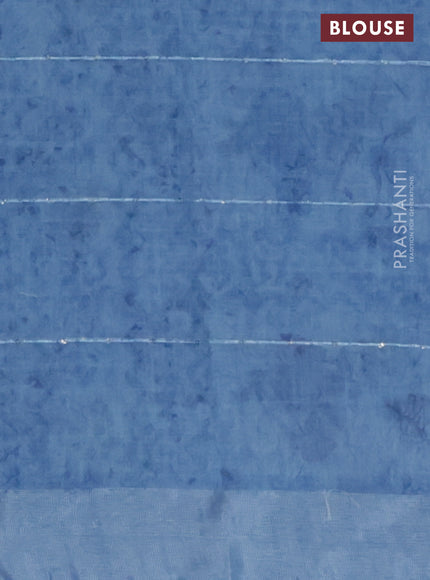 Linen cotton saree blue shade with floral butta prints & sequin work and silver zari woven border
