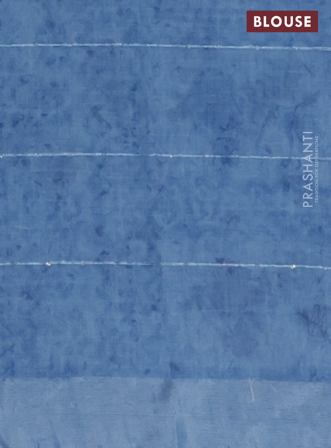 Linen cotton saree blue shade with floral butta prints & sequin work and silver zari woven border