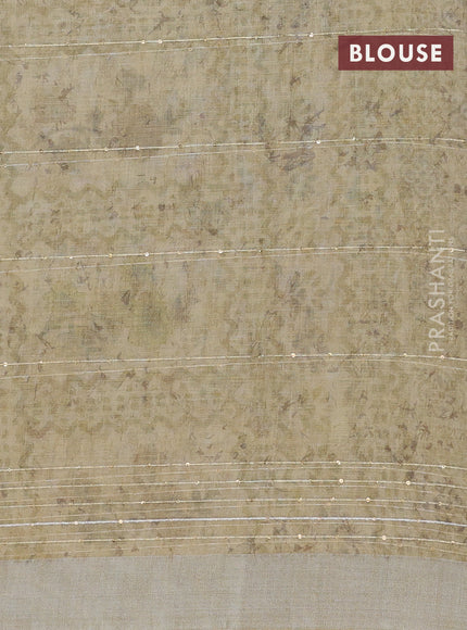 Linen cotton saree sandal with floral butta prints & sequin work and silver zari woven border