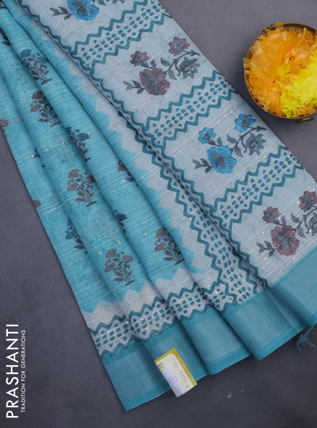 Linen cotton saree teal shade with floral butta prints & sequin work and silver zari woven border