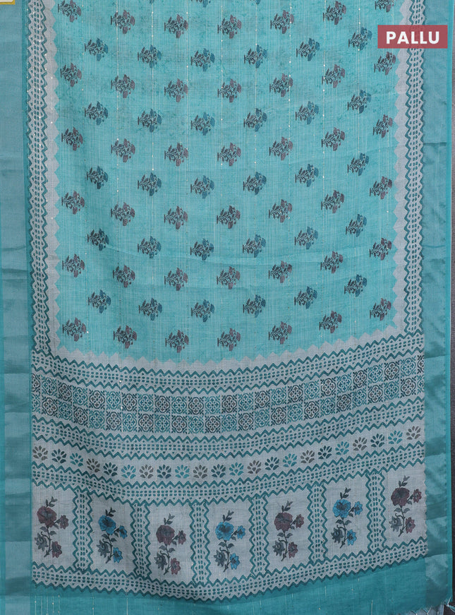 Linen cotton saree teal shade with floral butta prints & sequin work and silver zari woven border