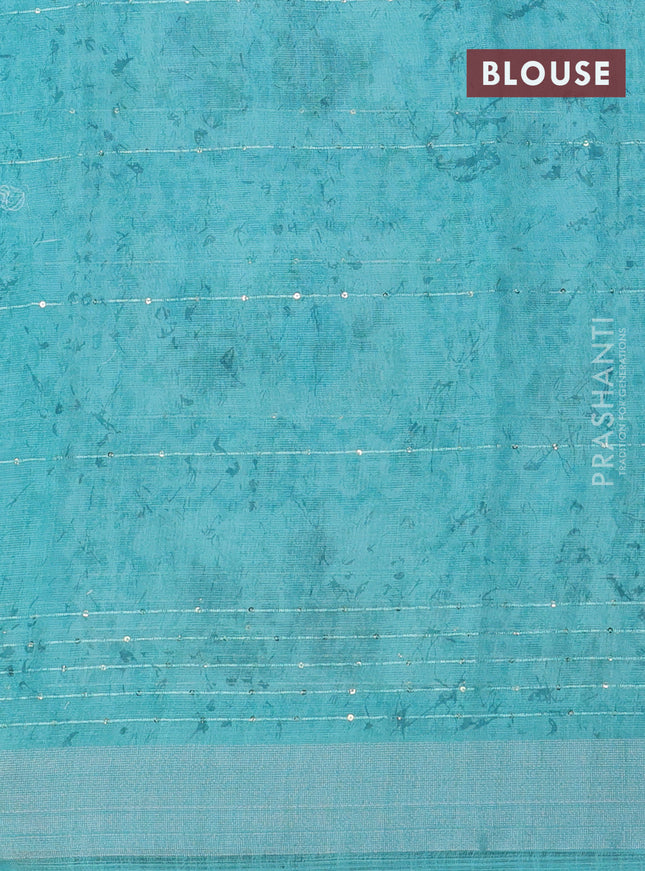 Linen cotton saree teal shade with floral butta prints & sequin work and silver zari woven border