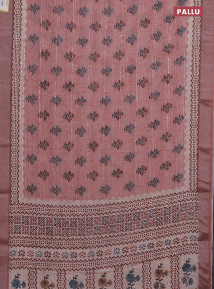 Linen cotton saree peach shade with floral butta prints & sequin work and silver zari woven border