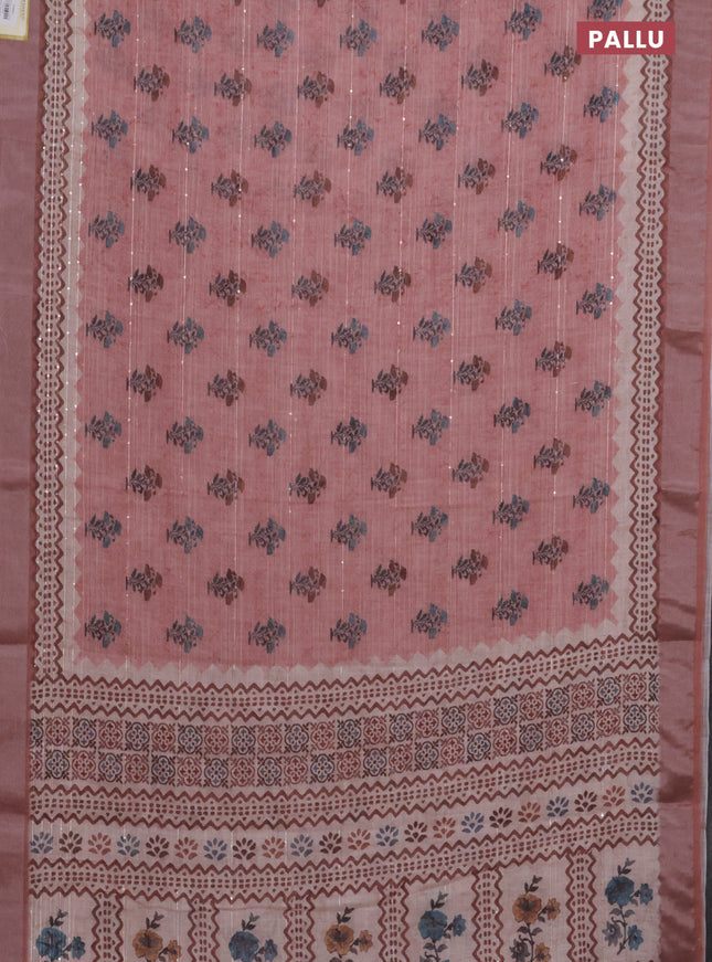 Linen cotton saree peach shade with floral butta prints & sequin work and silver zari woven border