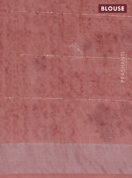 Linen cotton saree peach shade with floral butta prints & sequin work and silver zari woven border