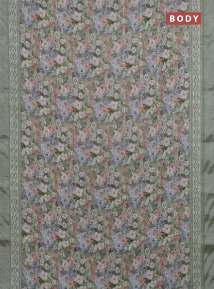 Linen cotton saree pastel green with allover floral prints & sequin work and silver zari woven border