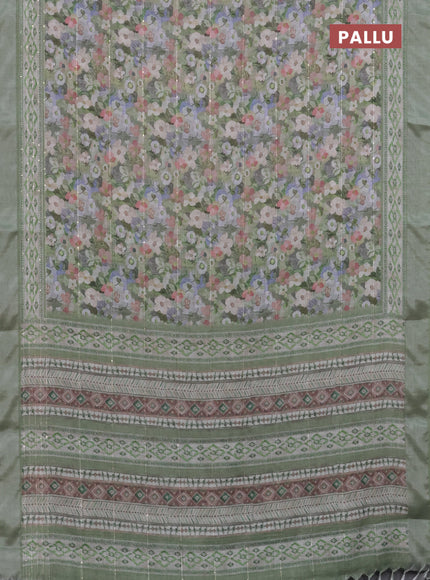 Linen cotton saree pastel green with allover floral prints & sequin work and silver zari woven border