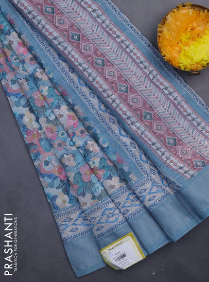 Linen cotton saree pastel blue with allover floral prints & sequin work and silver zari woven border