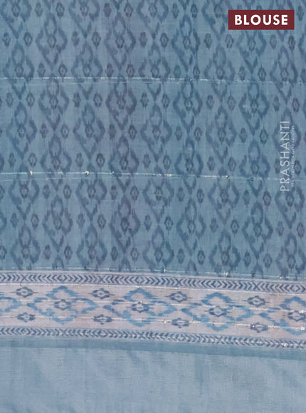 Linen cotton saree pastel blue with allover floral prints & sequin work and silver zari woven border