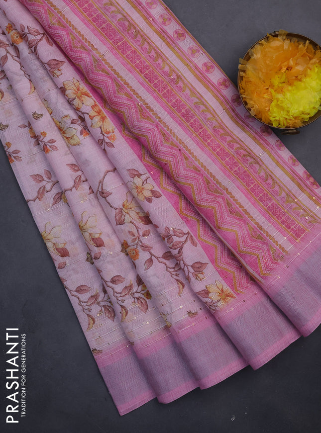Linen cotton saree peach pink and light pink with allover floral prints & sequin work and silver zari woven border