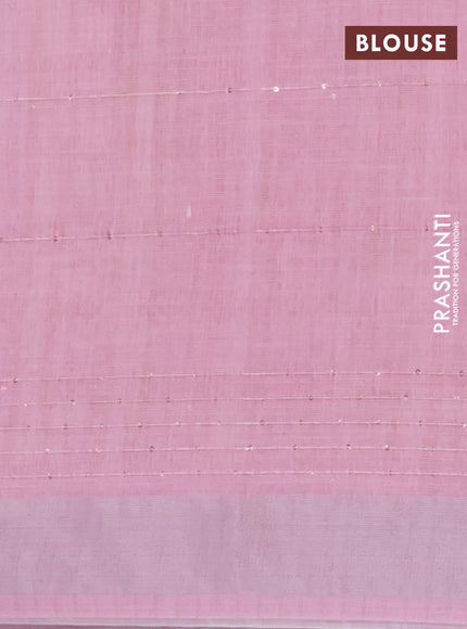 Linen cotton saree peach pink and light pink with allover floral prints & sequin work and silver zari woven border