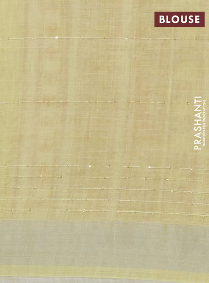 Linen cotton saree lime yellow with allover floral prints & sequin work and silver zari woven border