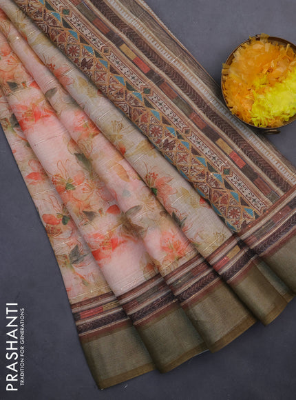 Linen cotton saree pale orange and dark sap green with allover floral prints & sequin work and silver zari woven border
