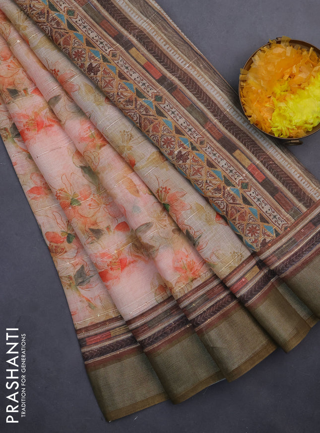 Linen cotton saree pale orange and dark sap green with allover floral prints & sequin work and silver zari woven border