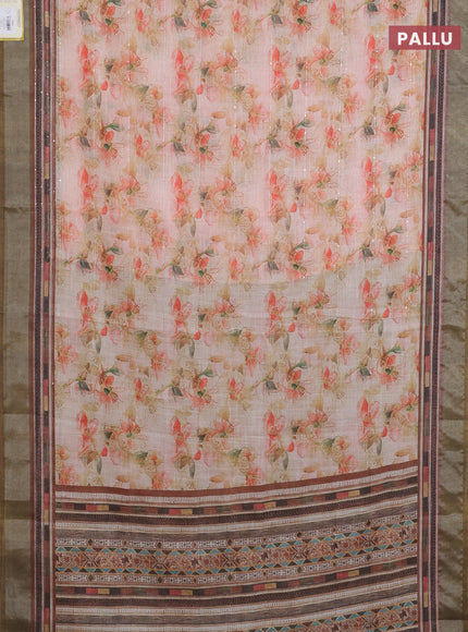 Linen cotton saree pale orange and dark sap green with allover floral prints & sequin work and silver zari woven border