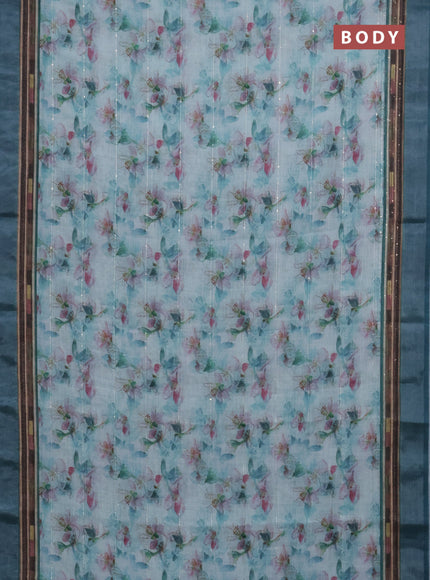 Linen cotton saree teal blue with allover floral prints & sequin work and silver zari woven border