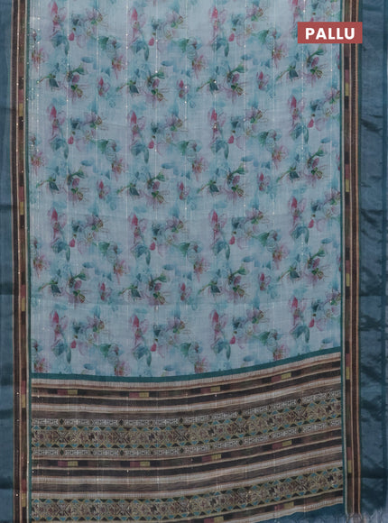 Linen cotton saree teal blue with allover floral prints & sequin work and silver zari woven border
