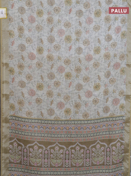 Linen cotton saree cream and sandal with allover floral prints & sequin work and silver zari woven border