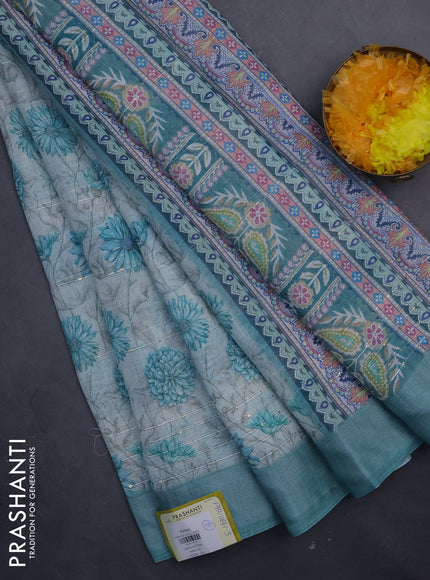 Linen cotton saree cream and teal green with allover floral prints & sequin work and silver zari woven border
