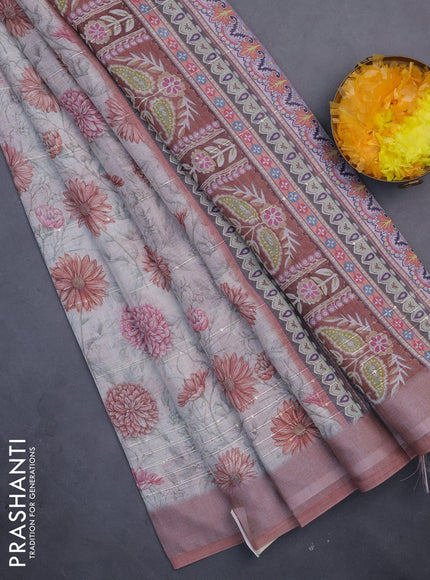 Linen cotton saree cream and pastel brown with allover floral prints & sequin work and silver zari woven border