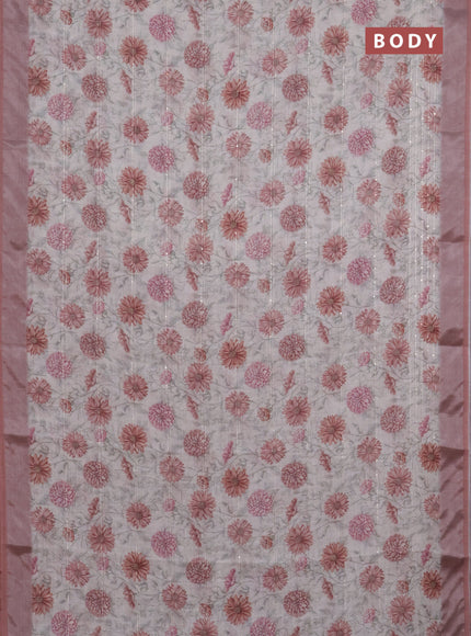 Linen cotton saree cream and pastel brown with allover floral prints & sequin work and silver zari woven border