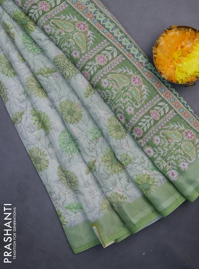 Linen cotton saree cream and green with allover floral prints & sequin work and silver zari woven border