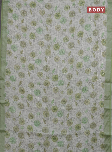 Linen cotton saree cream and green with allover floral prints & sequin work and silver zari woven border