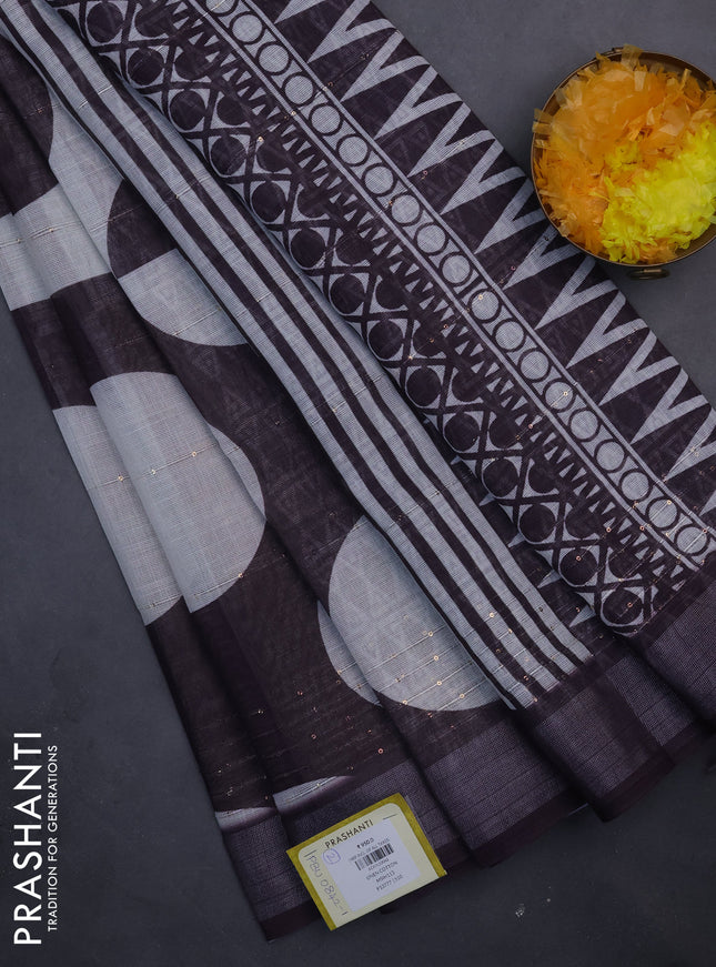 Linen cotton saree off white and wine shade with geometric butta prints and silver zari woven border