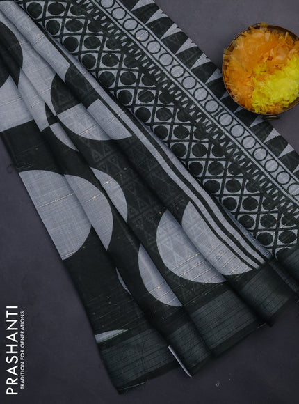 Linen cotton saree off white and bottle green with geometric butta prints and silver zari woven border