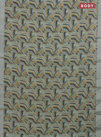 Linen cotton saree pastel green with allover geometric prints & sequin work and silver zari woven border